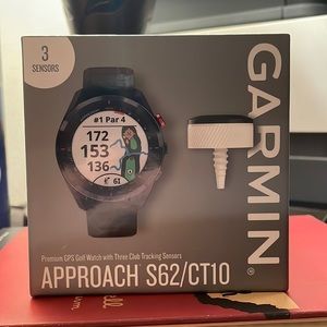 Brand new GPS Garmin Golf Watch with three club tracking sensors.